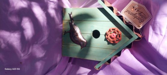 Decorative Wooden Birdhouse with Bird Figurine