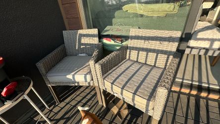 Gray Wicker Patio Armchairs With Beige Cushions