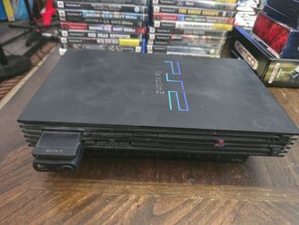 PS2 CONSOLE AND 46 GAMES
