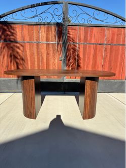 Oval table with storage