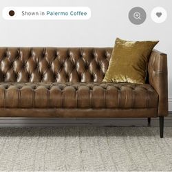 Tufted leather Chesterfield sofa