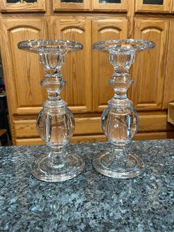Lot of 2 Heavy Glass Diamond Candlestick Holders. Color Clear.  Size Approximately 9 1/2 inches tall and 4 1/2 inches wide.  Preowned Excellent condit