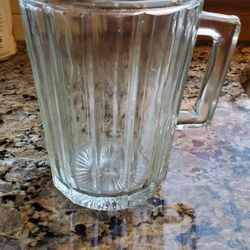 Vintage 7 Inch Heavy Ribbed Green Glass Pitcher.  