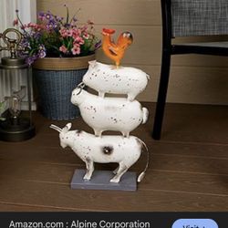 New Alpine Corporation Metal Stacked Farm Animals Decor is a whimsical statue featuring a rooster, pigs, and sheep stacked together