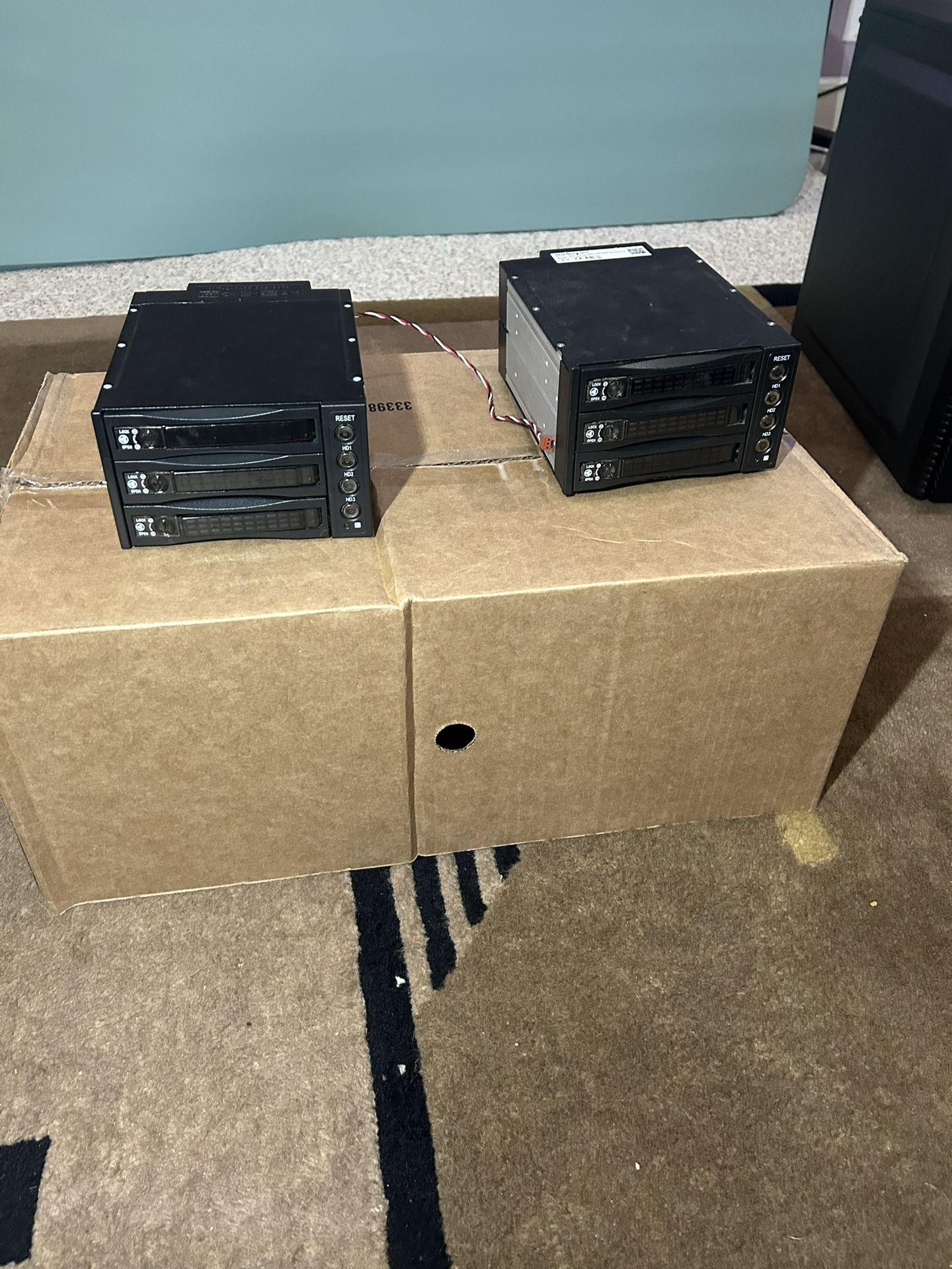 Two 2x5.25” to 3x3.5” HDD converters/backplanes (SAS/SATA) with trays.
