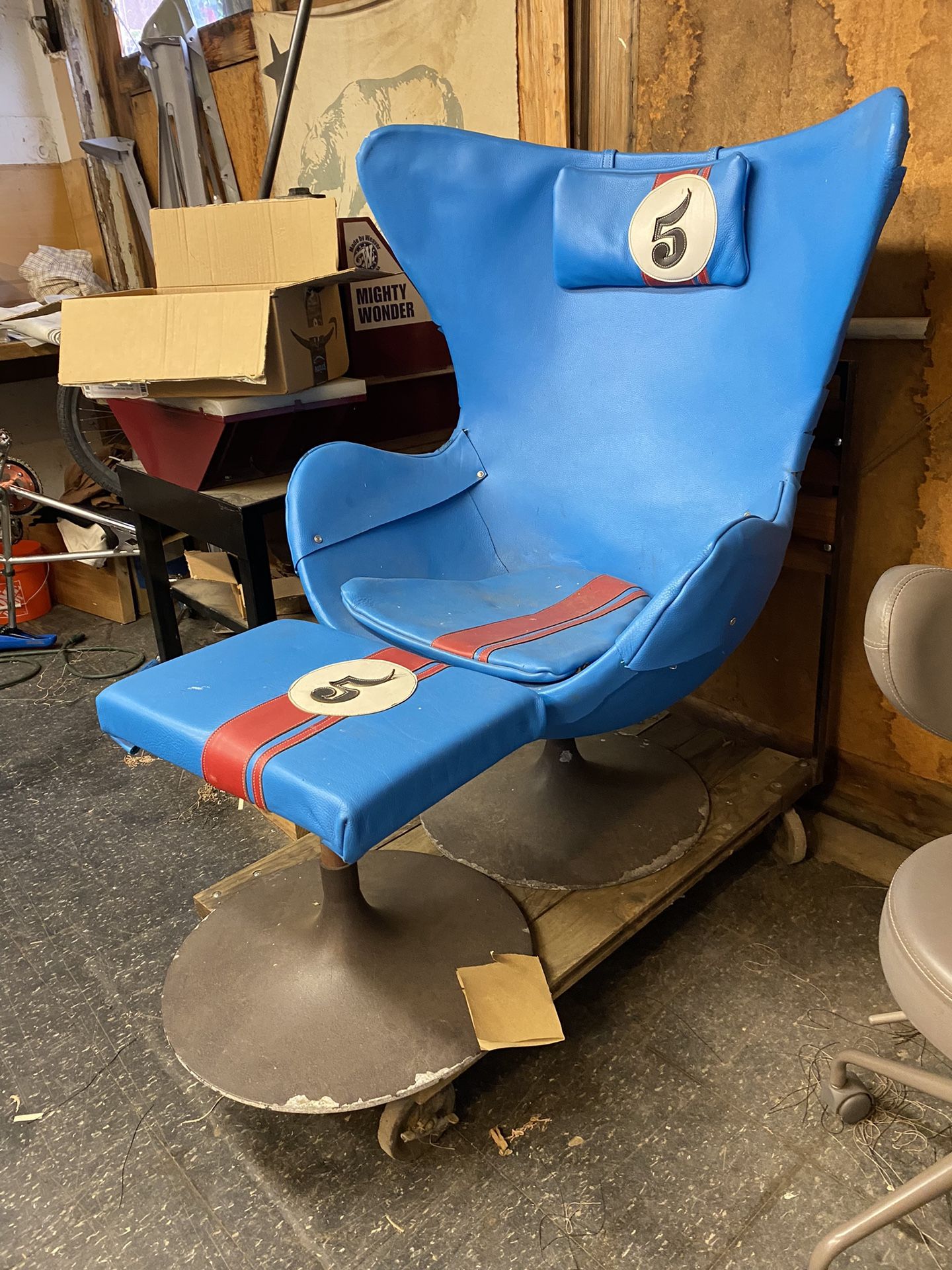 vintage egg chair that has recently been reupholstered in blue leather. The chair is an excellent condition. Perfect for a mid century, modern living 