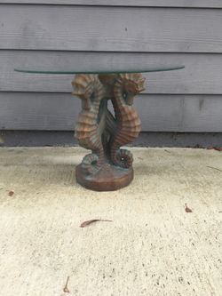 Seahorse pedestal table