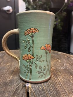 Beautiful signed coffee or tea mug decoration
