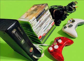 Microsoft Xbox 360 with 2 controllers 14  games HDMI cord power supply