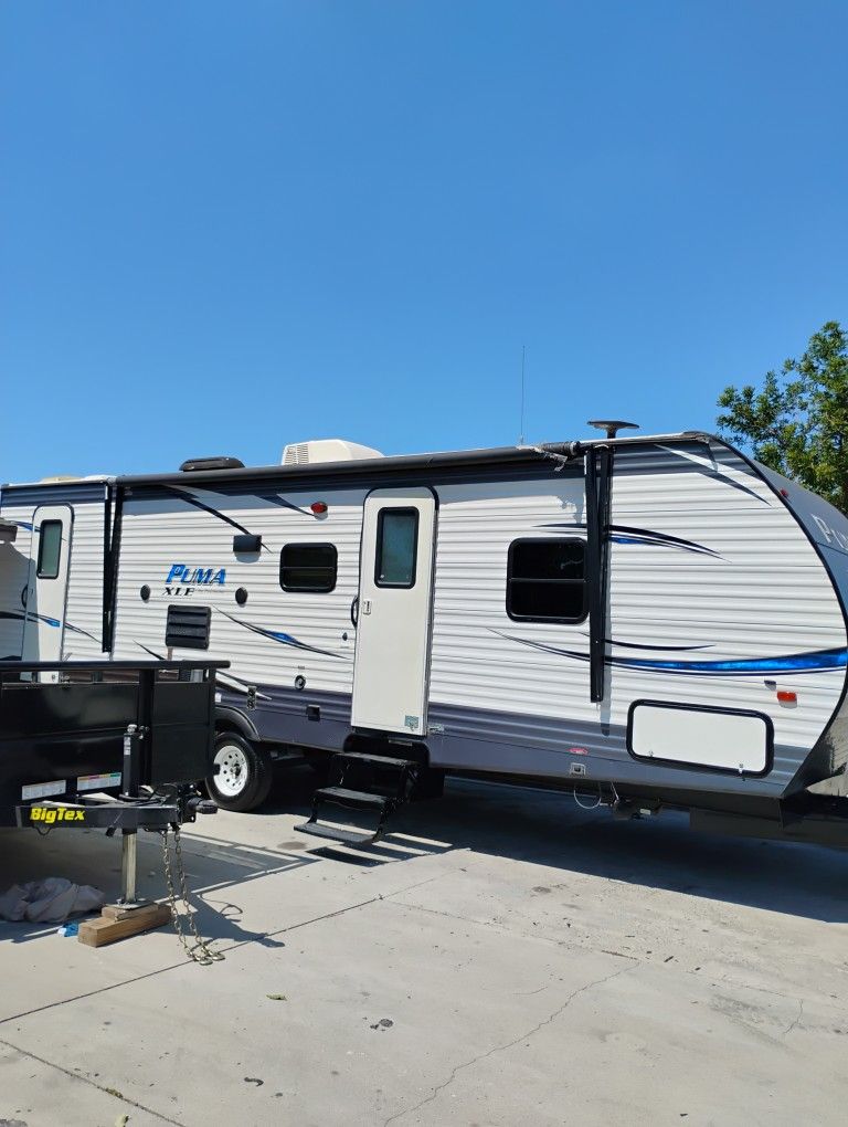 One Owner 2018 Pumba Tall Light 28 Ft Super Slide Out Double Door Entrance