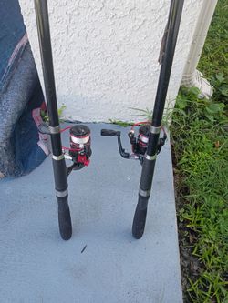 Two freshwater or sea water fishing poles lightweight up to 12 lb line. With all accessories included