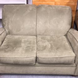 Light green beautiful loveseat easy to clean