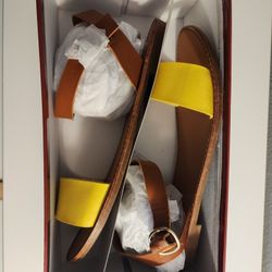 *Shipping Only* Breckelle's Women's flat sandals. Adjustable ankle strap, buck closure. Size 7.5. Tan and yellow color.  New in box.

