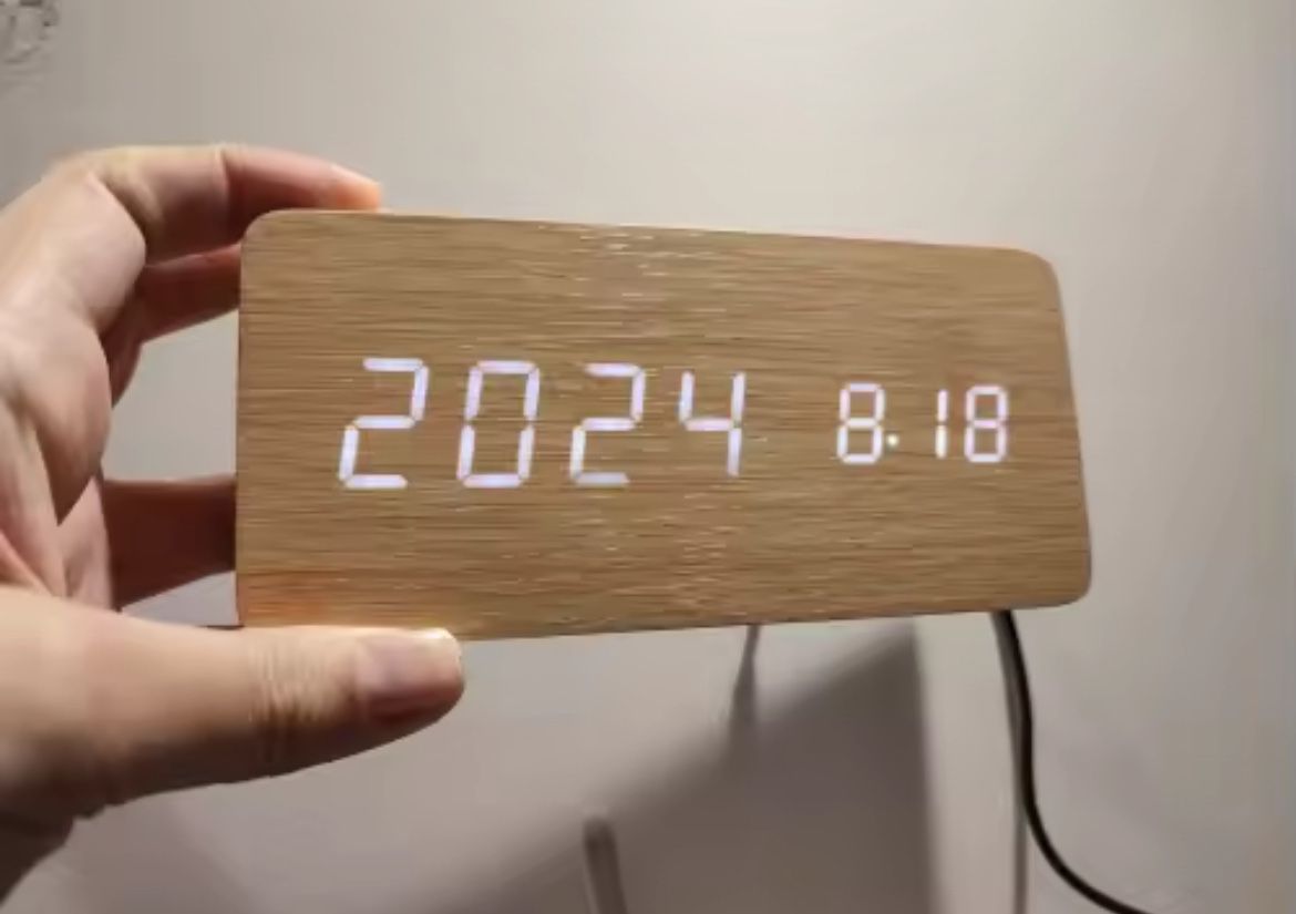 Digital clock with wooden frame, featuring 4 different styles