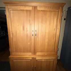 This piece of furniture can be used as a wardrobe or as a computer desk.74”H 46”W. 21”D comes in two pieces.