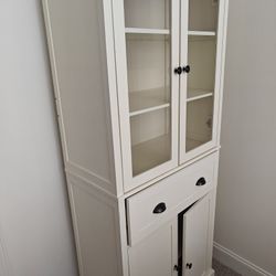 White cabinet with glass doors
