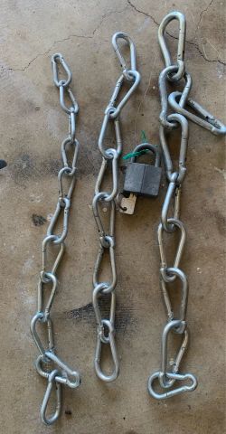 Metal chains with padlocks and hooks
