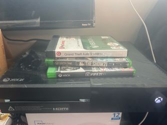 Xbox 1 with three controllers and 3 games