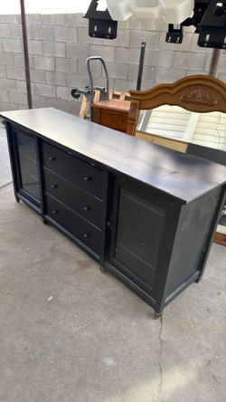 Entertainment center blk used some wear make offer