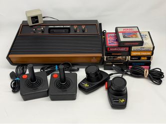 Atari 2600 Four Switch Console Bundle With Games Joysticks & Paddles Tested