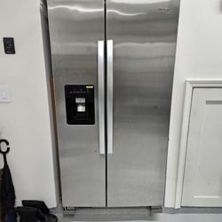 Stainless Steel Whirlpool 24.6 Cu Ft Side by Side With Ice And Water.