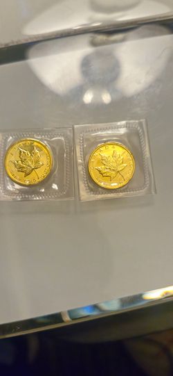 Two 1984 Elizabeth II Canadian Gold Maple Leaf $5 coin is gold coin minted by the Royal Canadian Mint. 1/10 troy ounce