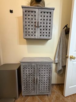 Bathroom wall, floor and over the toilet cabinets