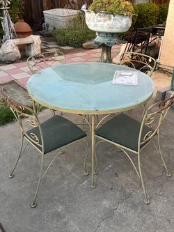 BEAUTIFUL WROUGHT IRON TABLE AND CHAIRS