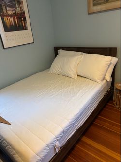 Full size mattress and wooden bedframe
