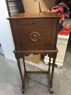 Antique fold down front telephone desk