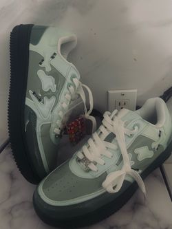Mint Green Low-Top Sneakers with Bone Graphic