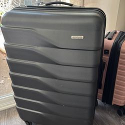 Grey hard suitcase