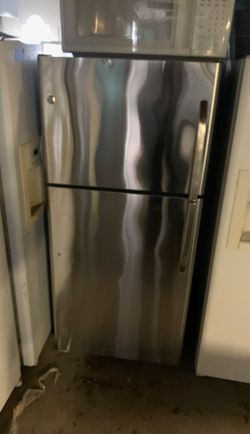GE stainless apartment size refrigerator