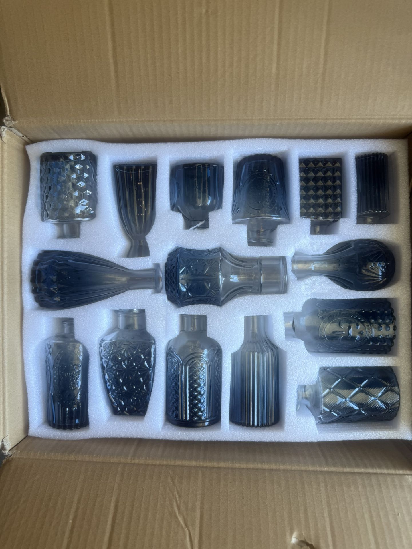 32 Blue small bud vases for a wedding birthday or any kind of decoration they’re beautiful colors asking 45