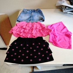 (4)Sizes 4 To 4/5, Items (2) Ruffled Skirts With Short, (1) Jean Skirt With Short, I Short  