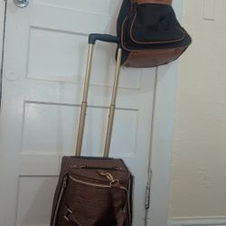 Guess Carry on Bag on Wheels Like New with free Samsonite bag