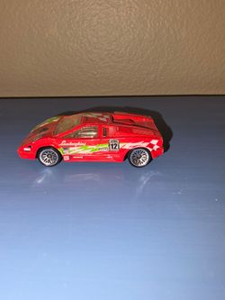 Hot Wheels 25th Anniversary Lamborghini Countach, red #12 “World Racers” version.