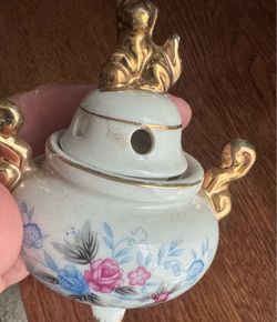 Vintage pottery piece gold colored dog
