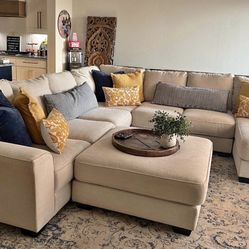 Ashley Furniture large cream sectional with ottoman