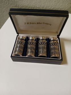 4 F.B. Rogers silver plate small cylindrical shakers