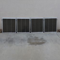 Four 50 W solar panels for sale.