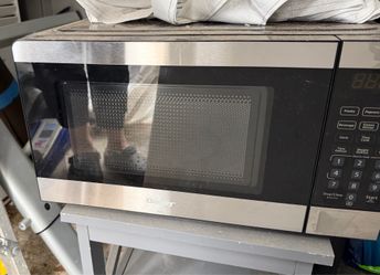Leather recliner, microwave and other items