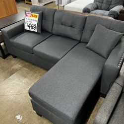 SPECIAL:  2pc. Reversible Sectional (in Gray Or Black!).   NEW in Boxes!  (Reg. $600)