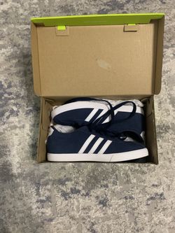 Woman’s Adidas 6.5