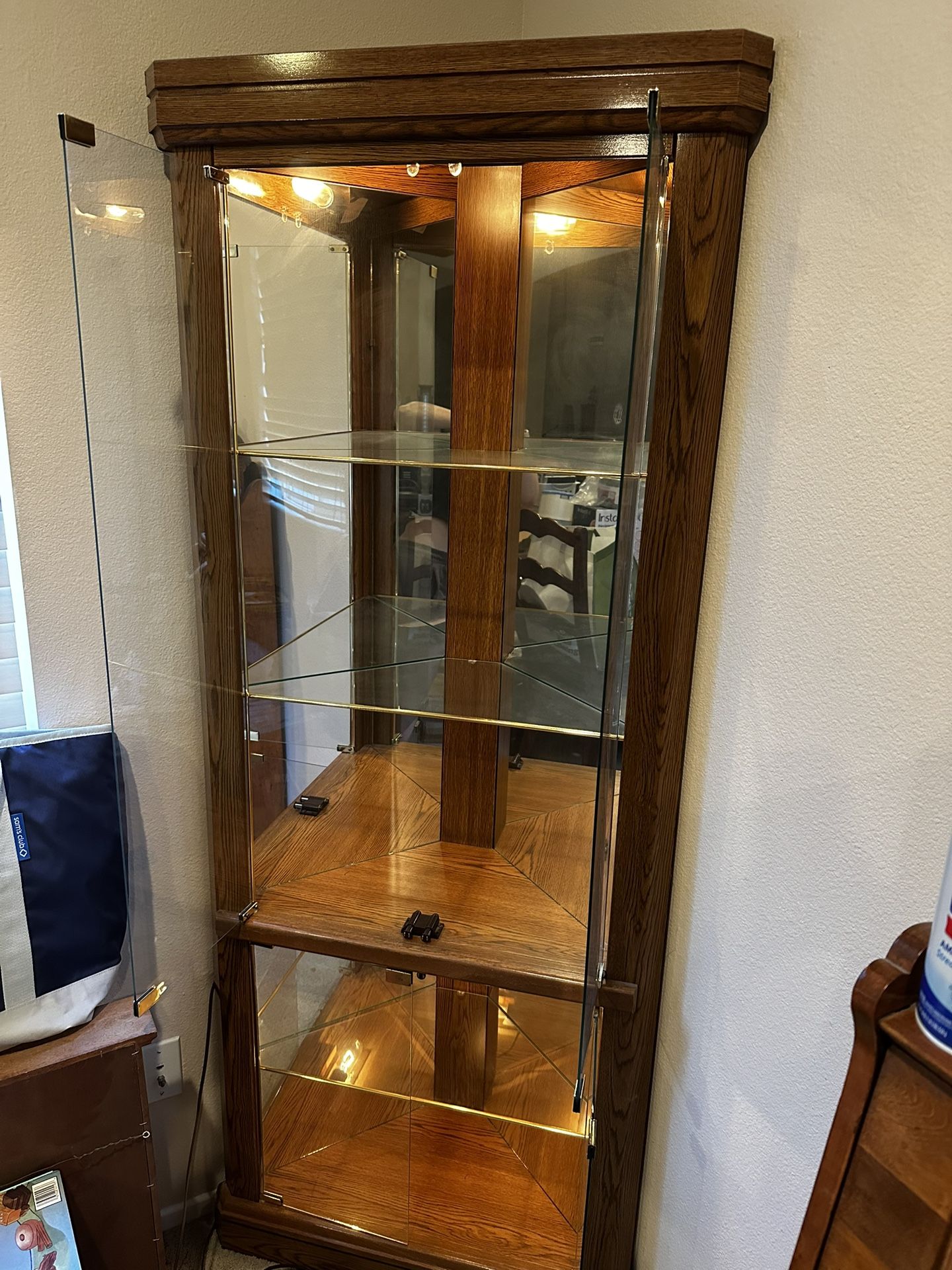 Oak Lighted Corner Curio Cabinet – Glass Shelves & Mirror Back
