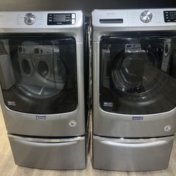 front load washer and dryer on pedestals