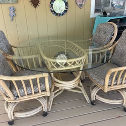 Tropical vibes real rattan table and 4 swivel chairs