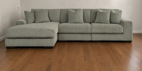 (Like New) Large Sectional Sofa with Chaise from Ashley Furniture