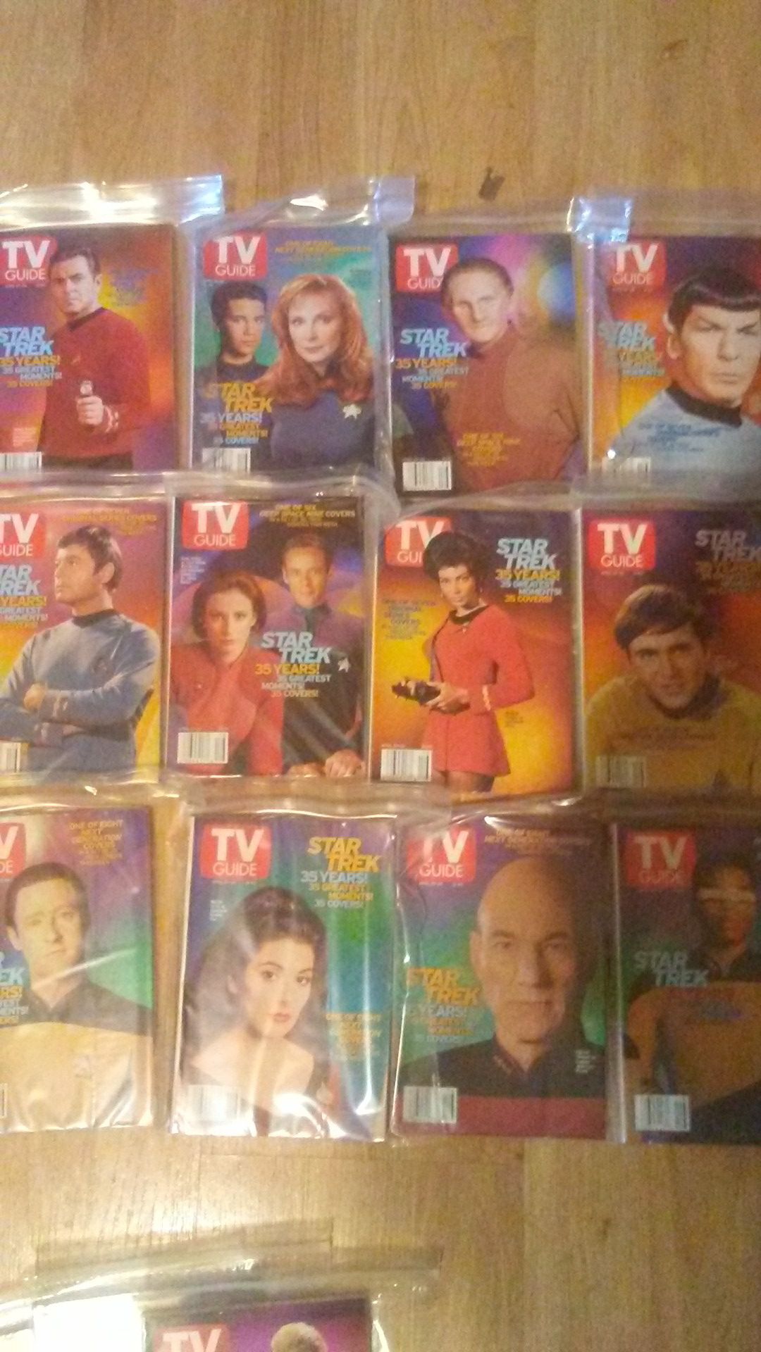Collection of 35 tv guides with star trek on the cover and article inside