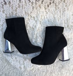 NEW black booties with glass heel